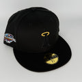 Black baseball cap with logo and World Series patch on a white background