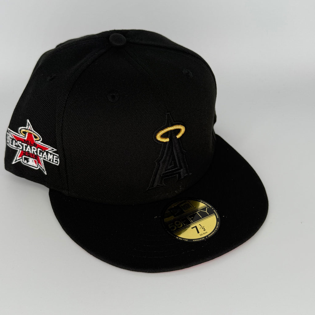 Black baseball cap with logos on a white background